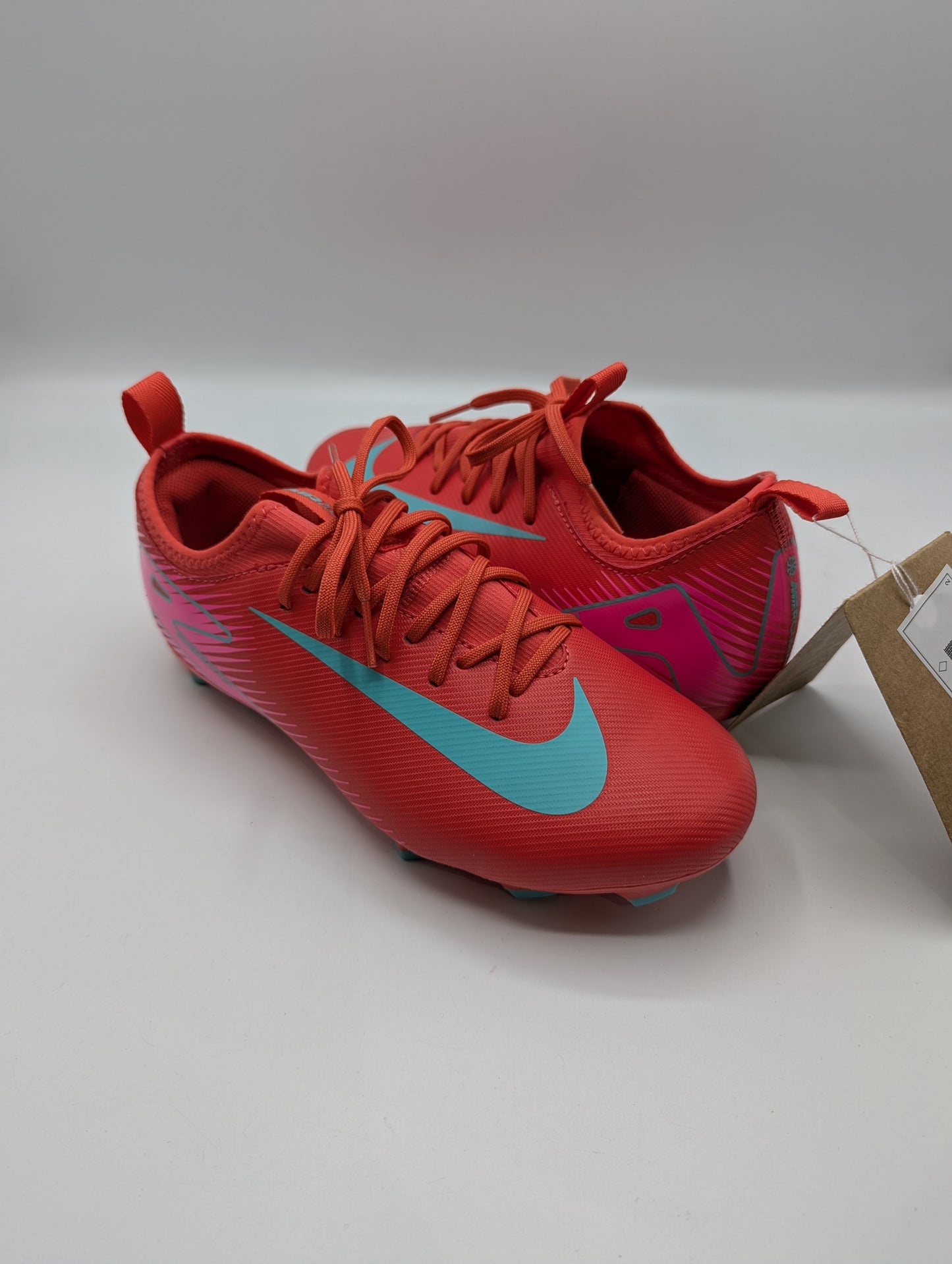 Nike Zoom Mercurial Vapor 16 Academy Juniors Firm Ground Football Boots - Red / green